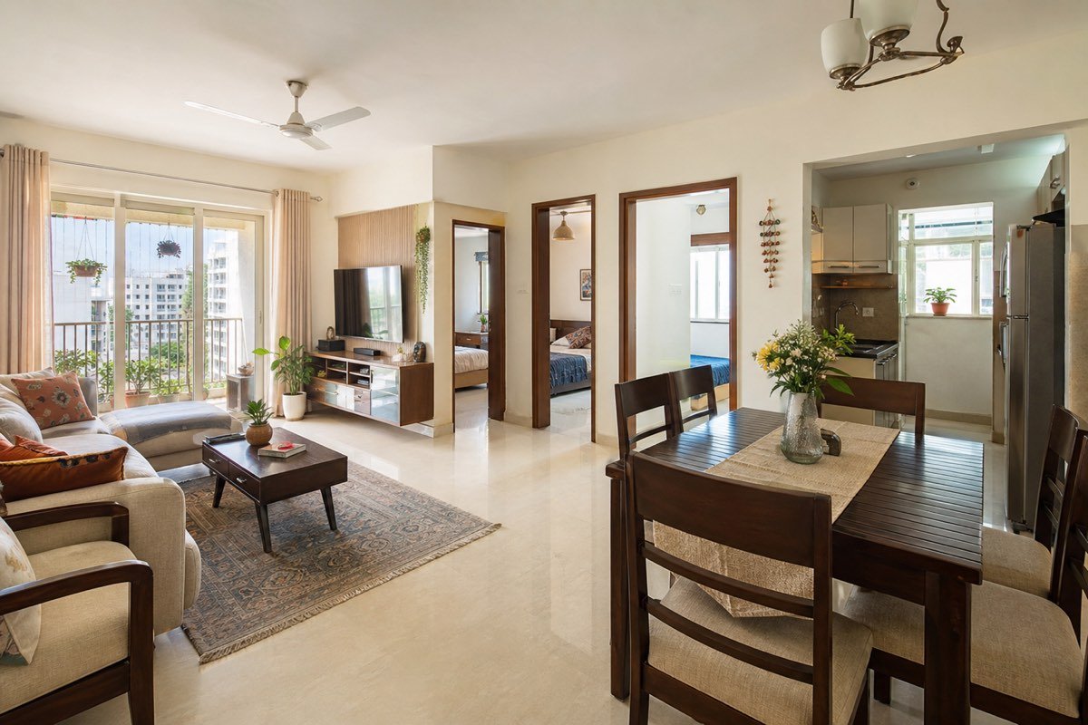 Realistic bright modern Indian 2BHK apartment living and dining area
