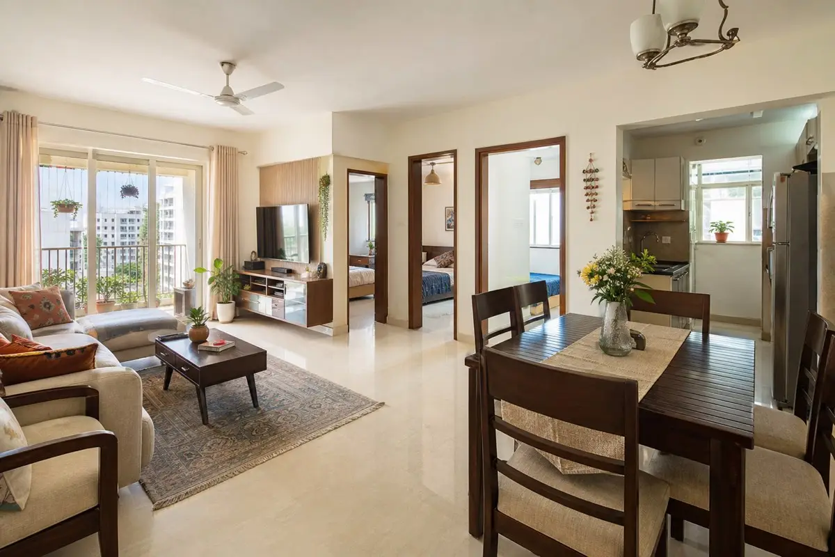 Realistic bright modern Indian 2BHK apartment living and dining area