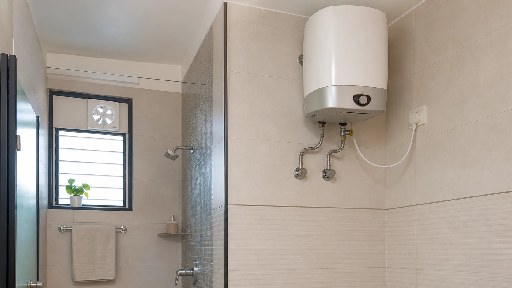 Realistic Indian apartment bathroom with wall mounted geyser on a dry ventilated side wall away from shower splash